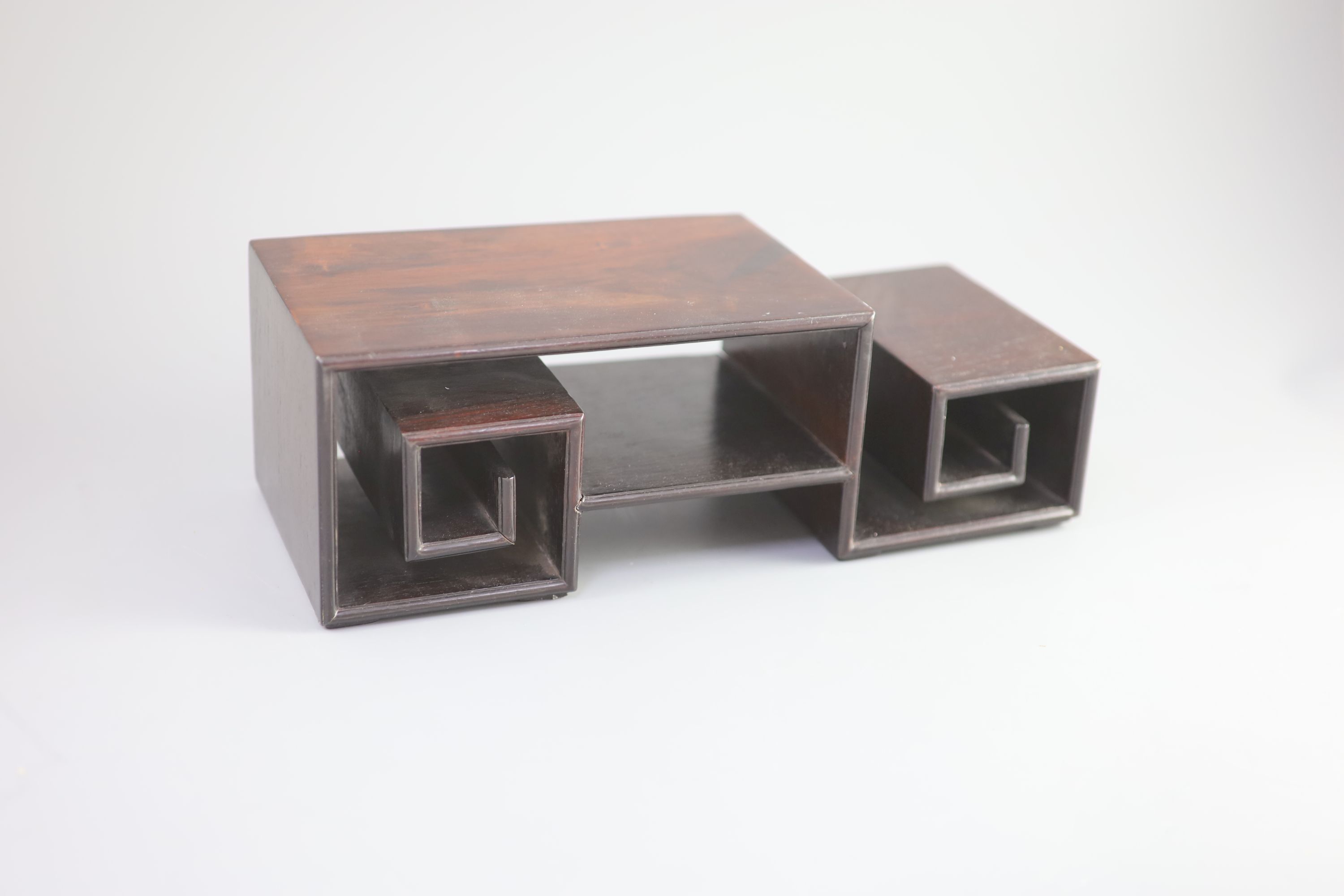 A Chinese hongmu scholar’s stand, 19 century, 34 cm wide